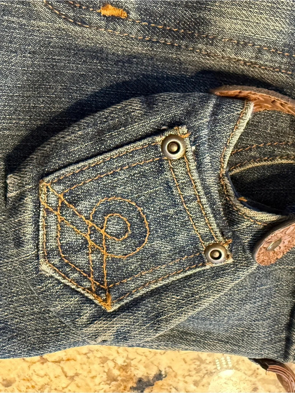 Denim Hobo Bag with Embroidered Accents and Tassel Charm